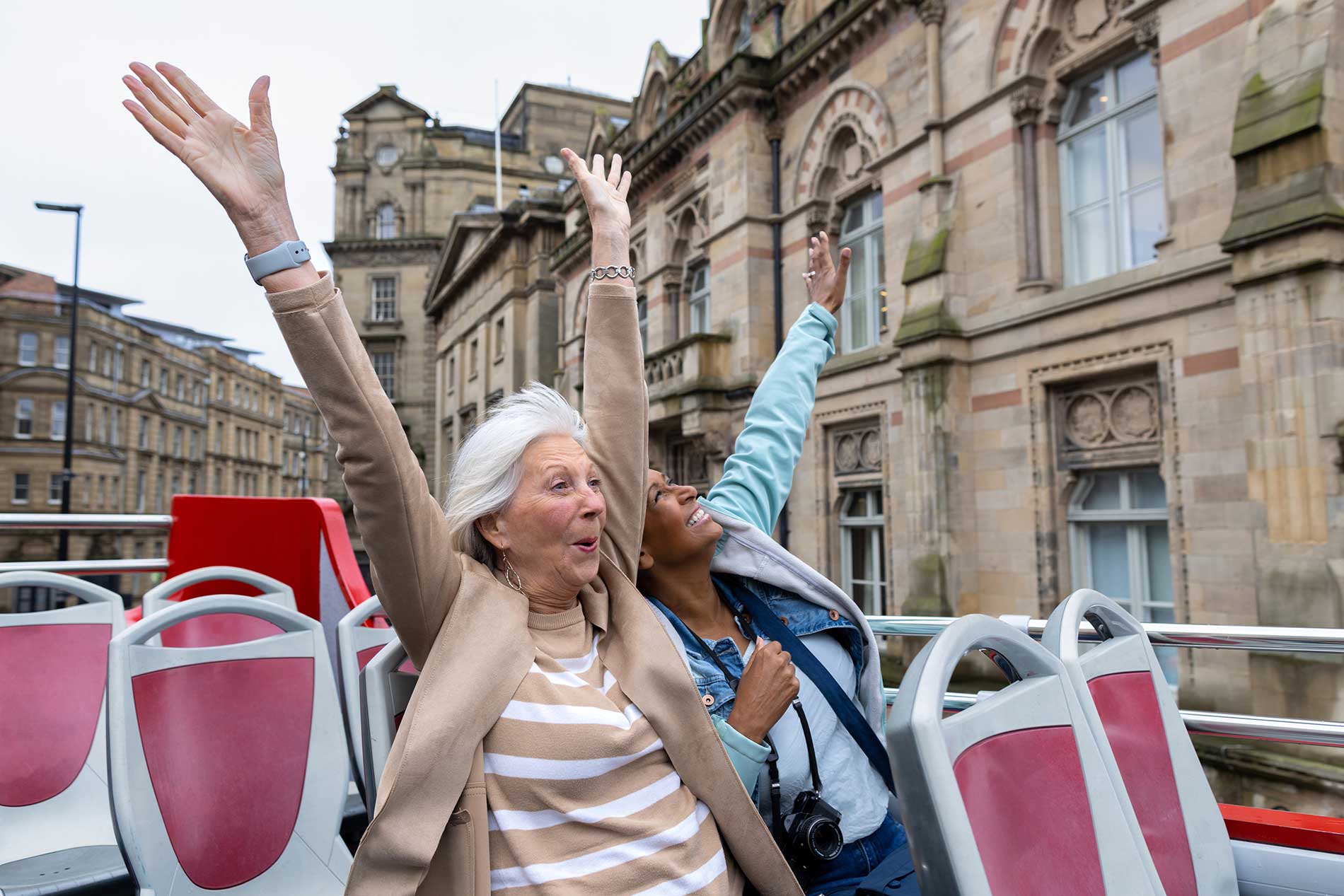 happy travellers open bus tour England