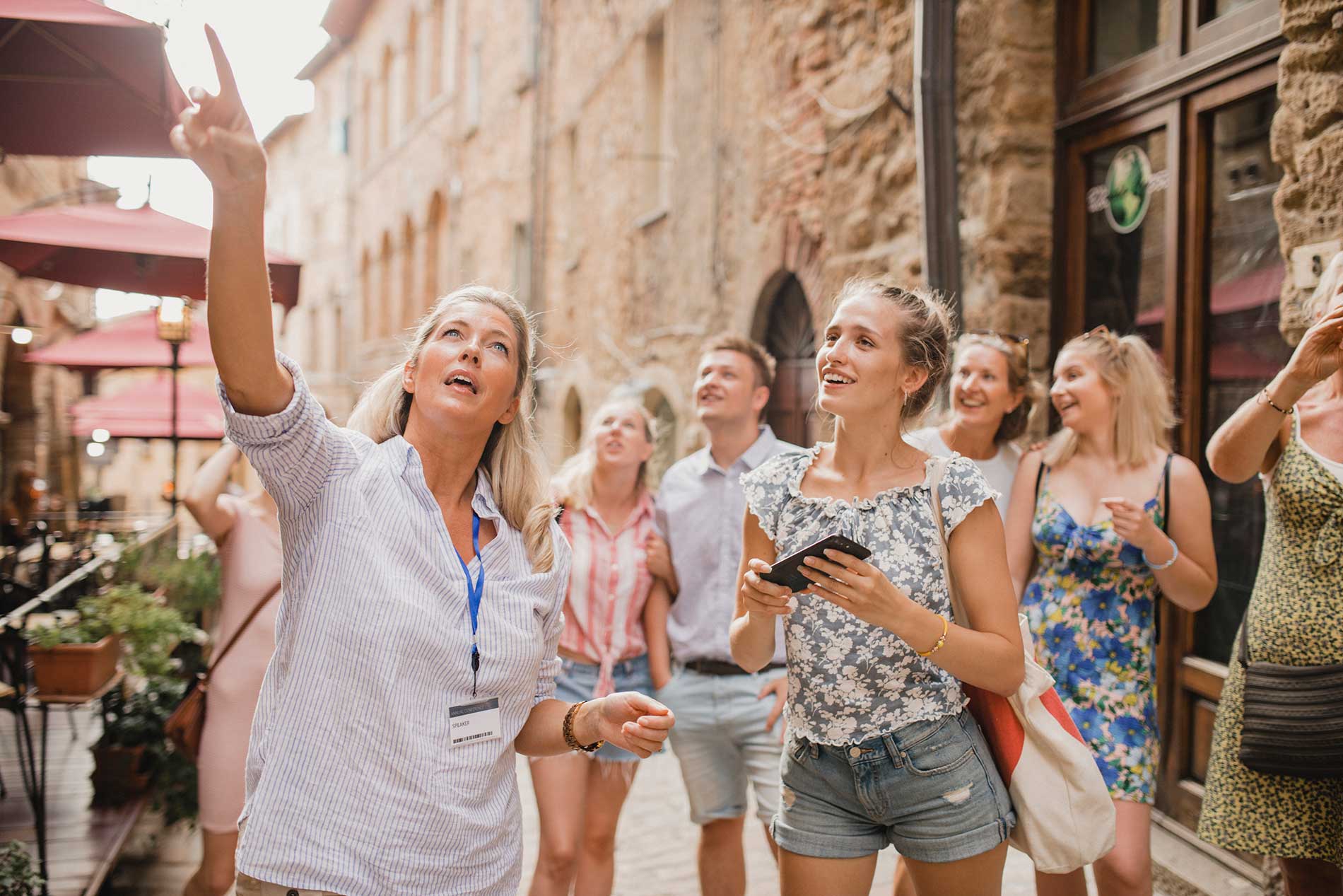 Escorted tour group exploring a European town