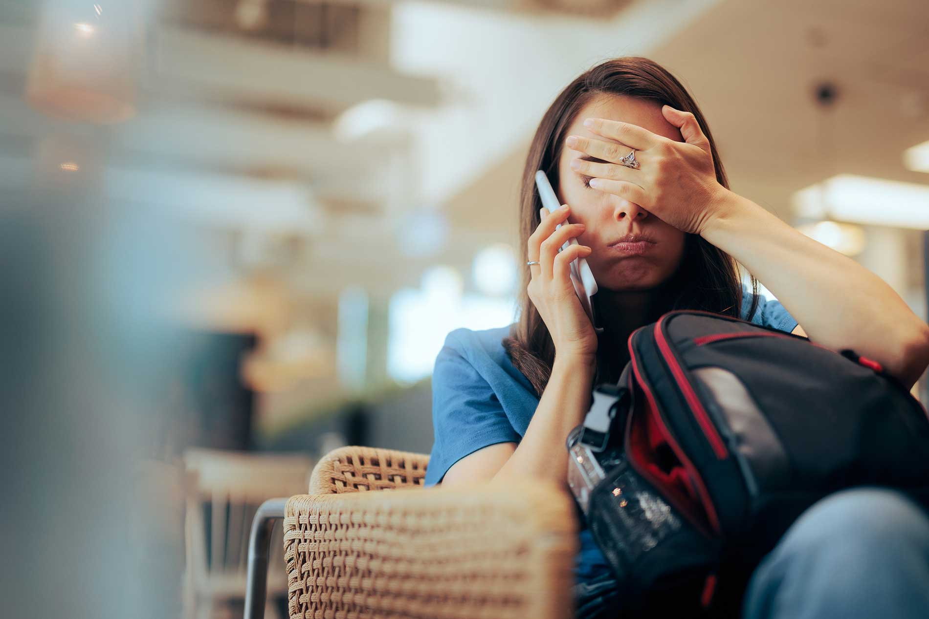 Aeroplane wing above the clouds — avoiding common travel booking mistakes