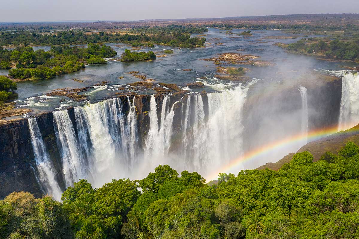Botswana and Namibia holidays from Australia — a mokoro gliding through the Okavango Delta