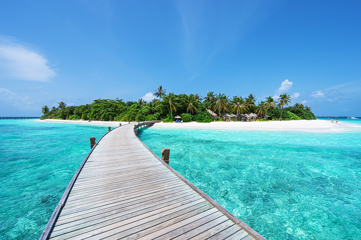 Maldives honeymoon — overwater villas in turquoise lagoon