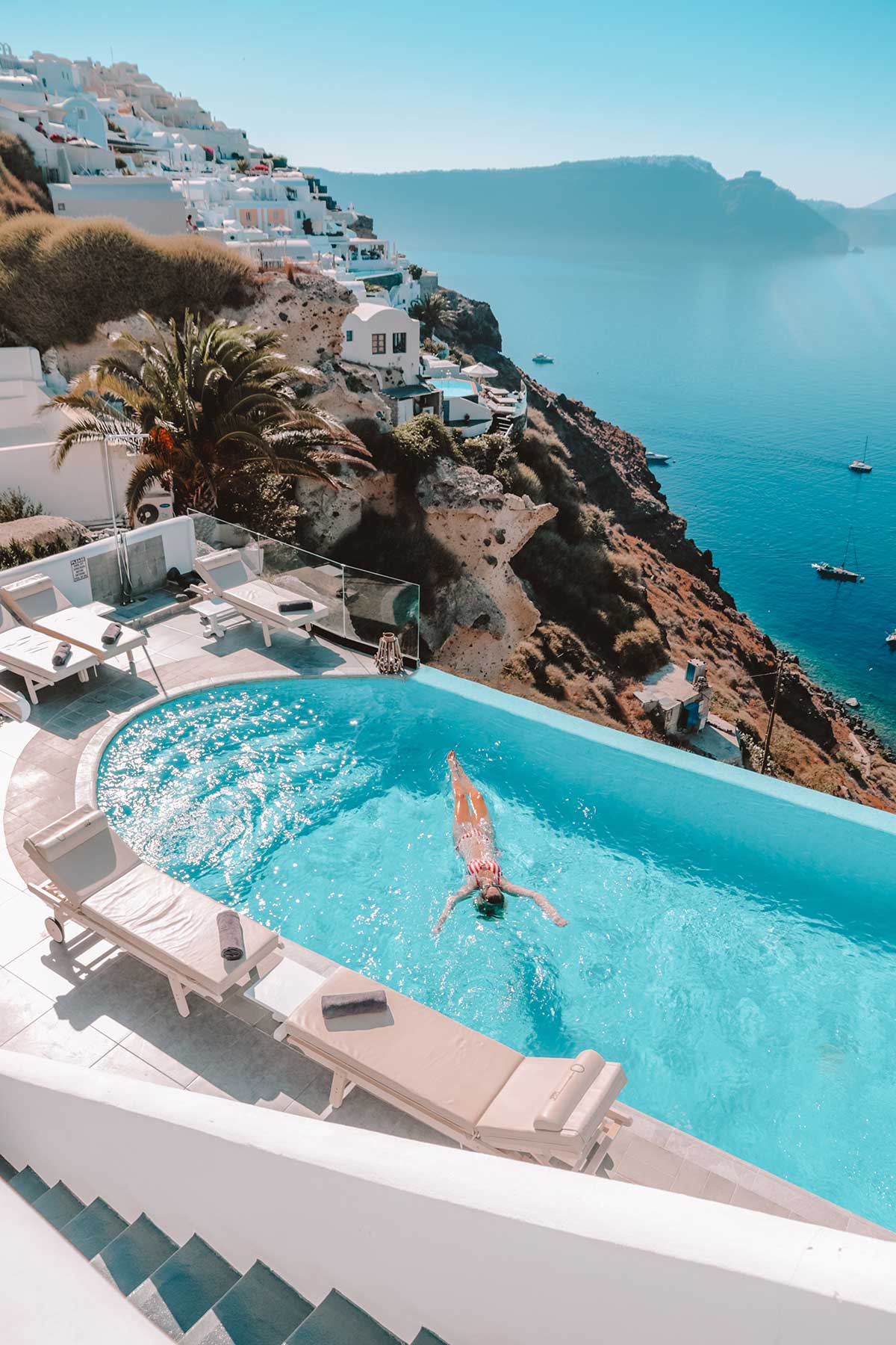 Greece luxury — Santorini cliff-top hotel suite